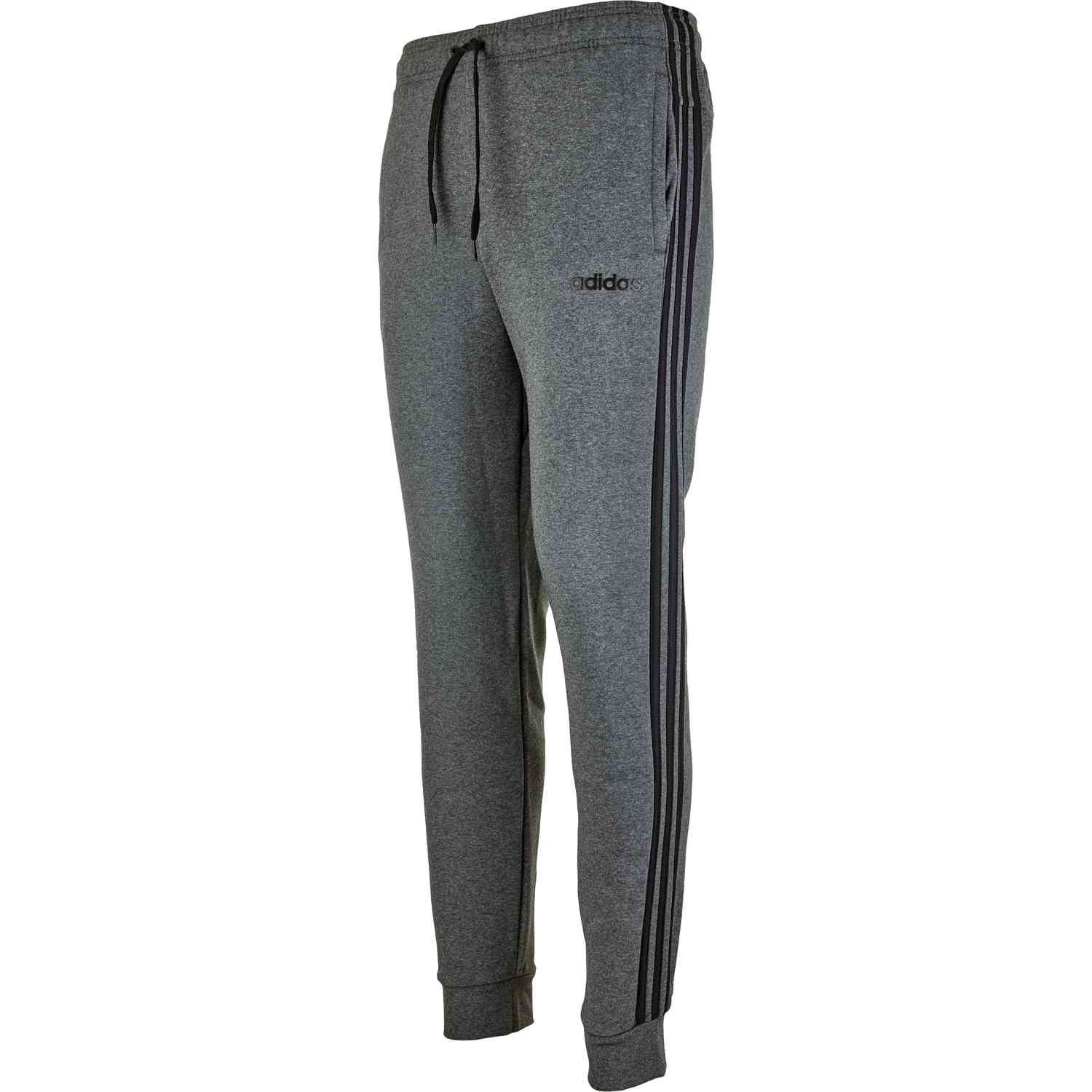 grey adidas pants with black stripes